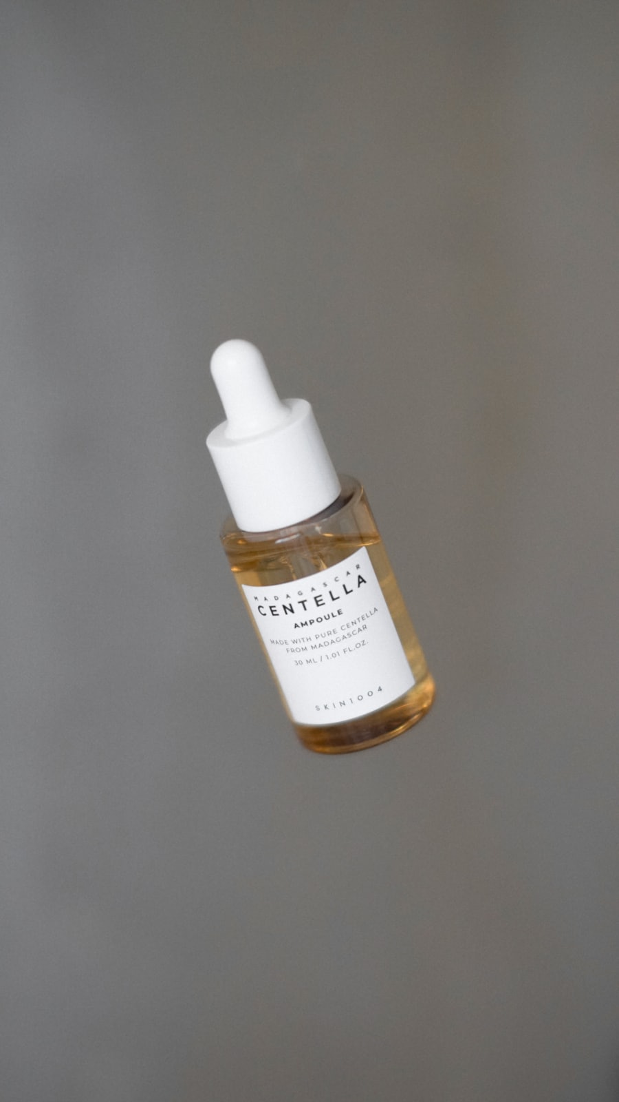 Frosted glass serum bottle of Bakuchi Serum